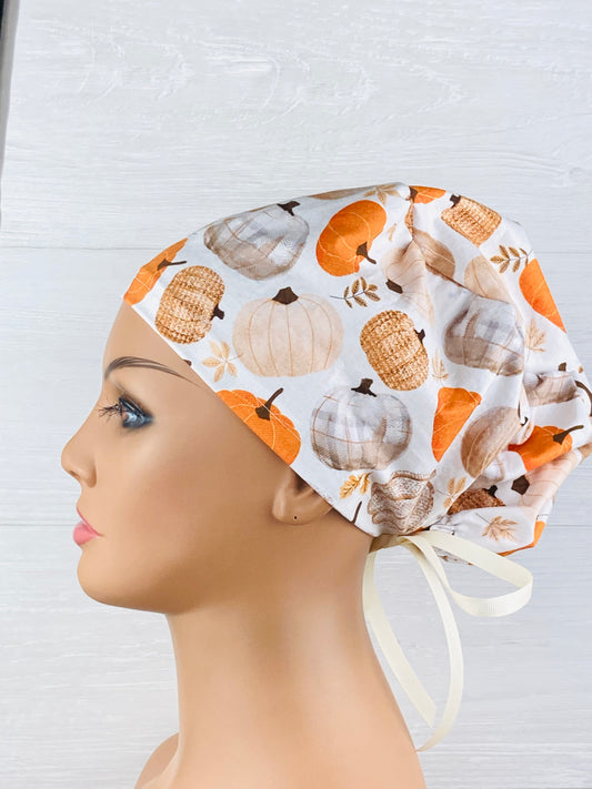Patterned Pumpkins on Cream Women's Tieback Hat