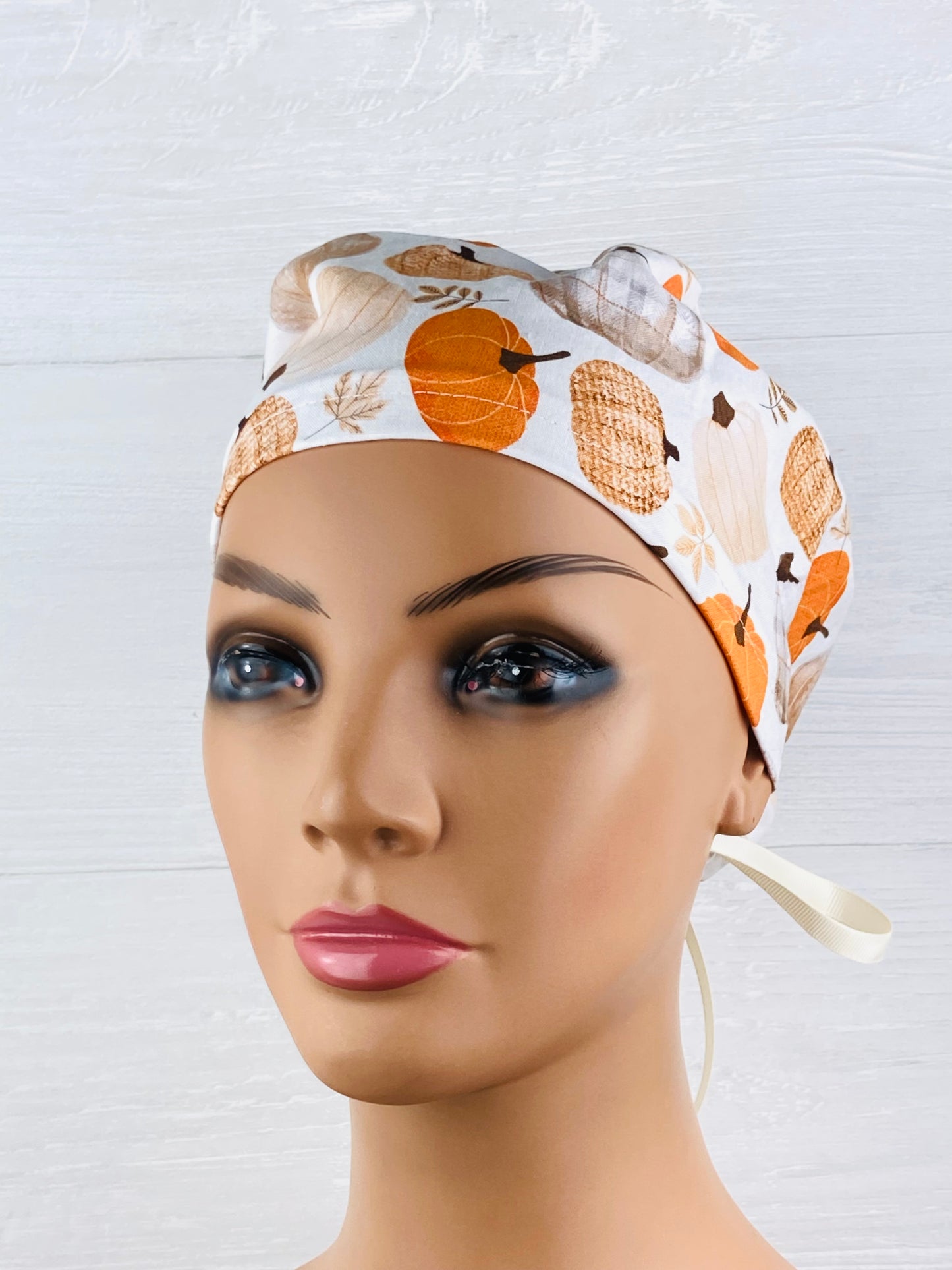 Patterned Pumpkins on Cream Women's Tieback Hat