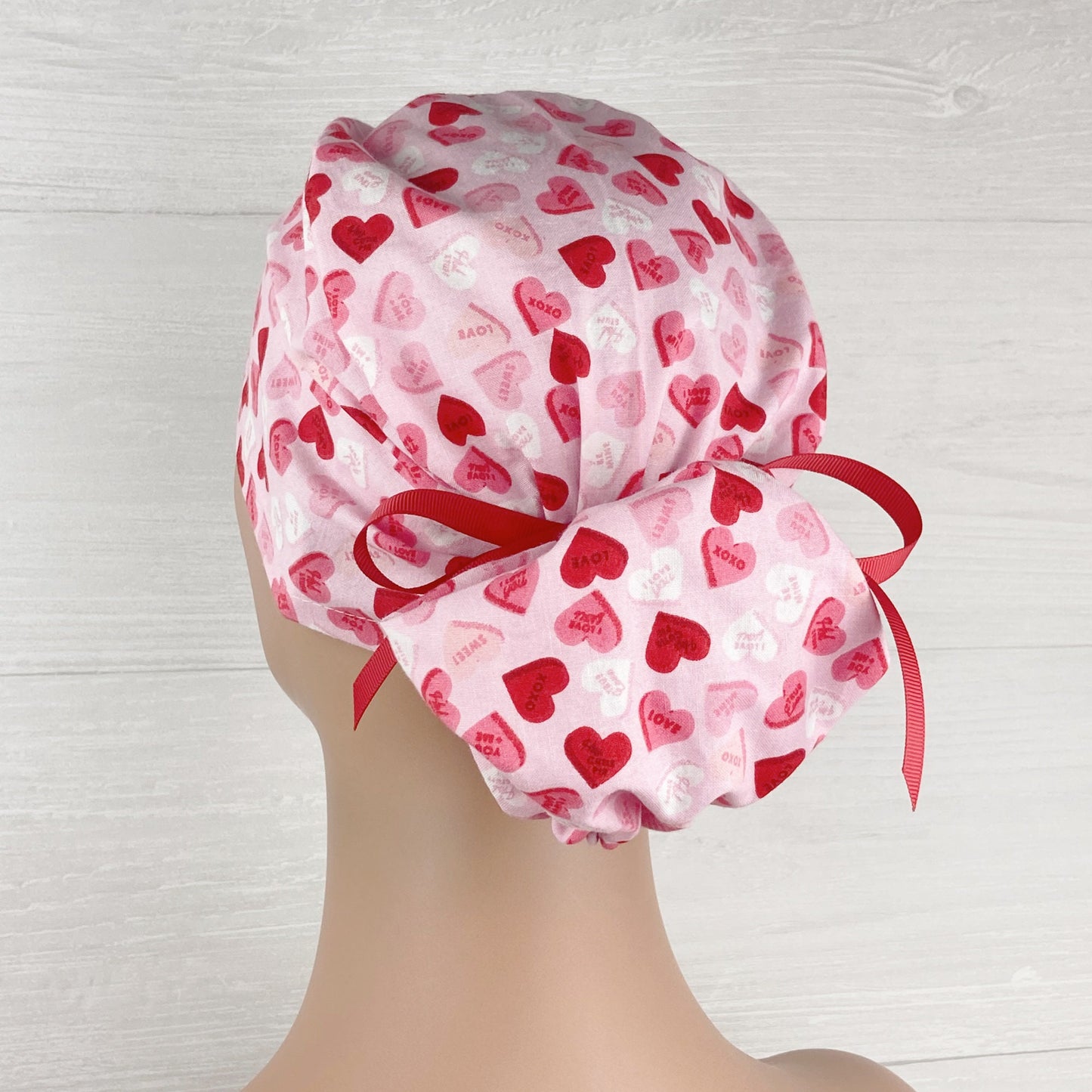 Candy Hearts on Pink Ponytail Scrub Hat