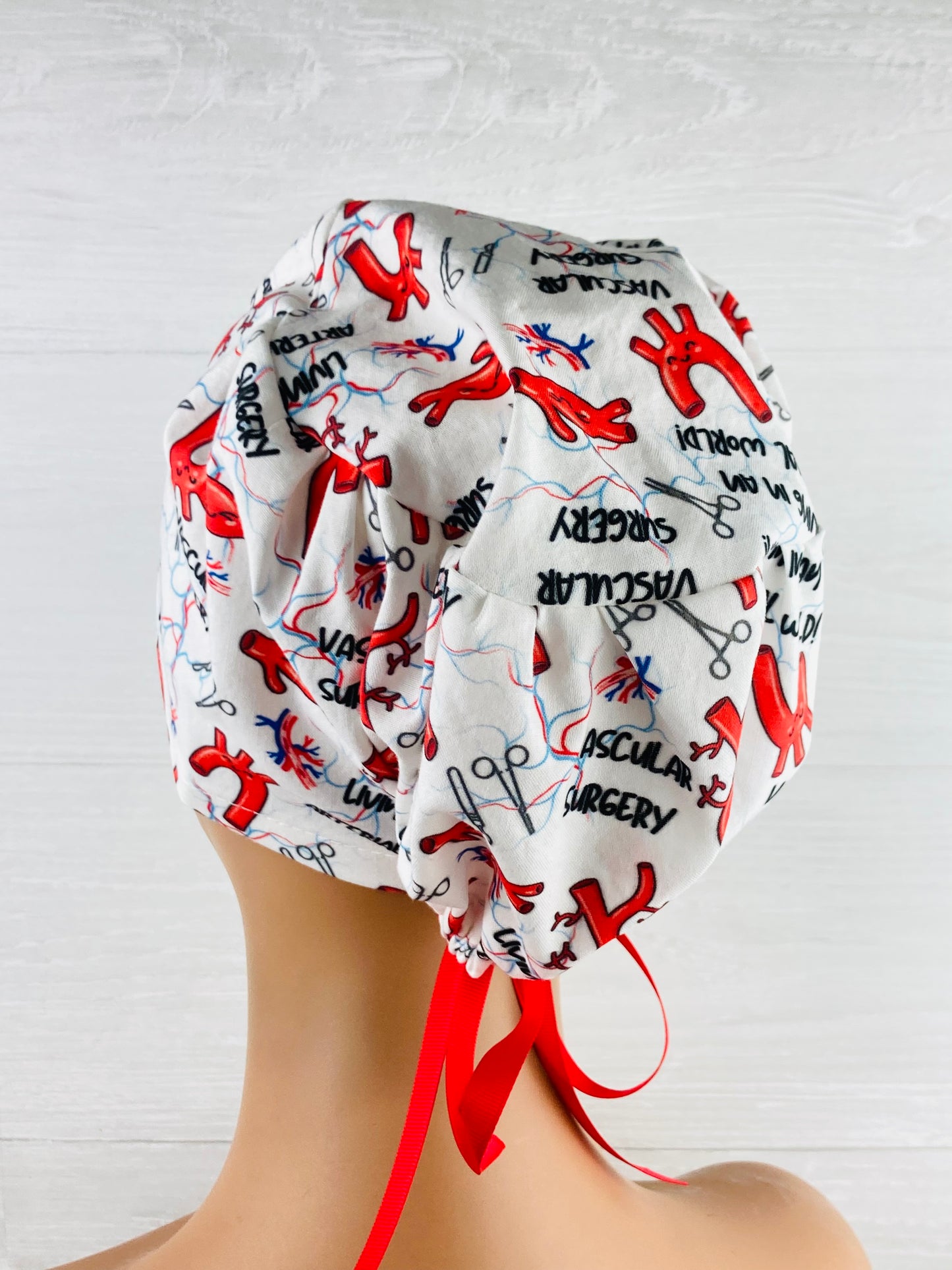 Living in an Arterial World Vascular Surgery Women's Tieback Hat