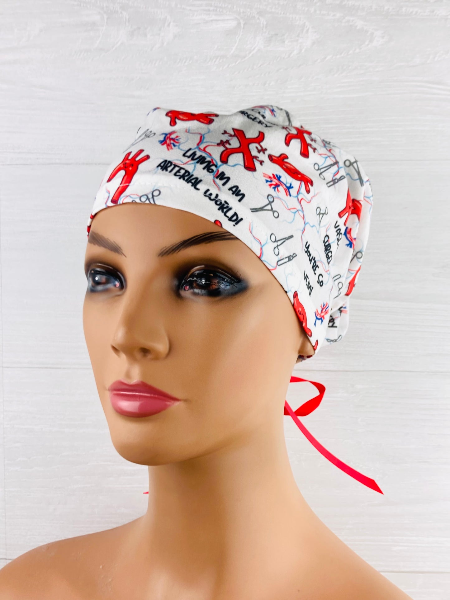 Living in an Arterial World Vascular Surgery Women's Tieback Hat